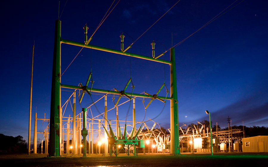 High-voltage transmission tower at night