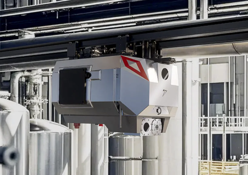 Overhead track-hanging inspection robot patrolling an industrial plant