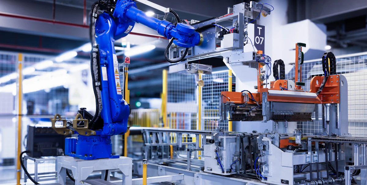 Precision industrial robot arm operating on a production line